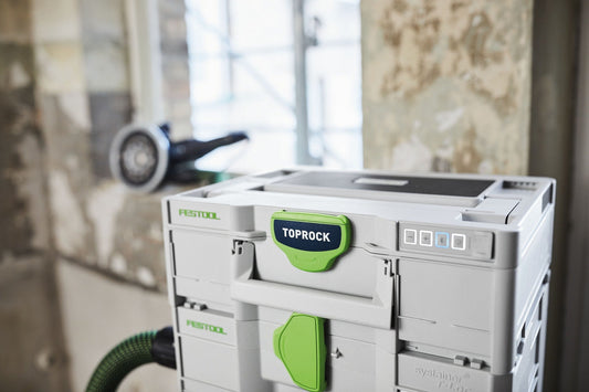 Festool TOPROCK SYS3 BT20 M 137 Bluetooth Lautsprecher in Systainer mit grünen Bedienelementen auf Baustelle